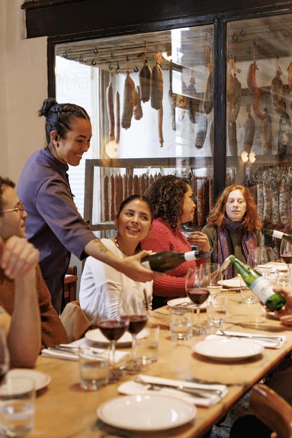 Buenos Aires: Local Foodie Adventure with Sherpa Food Tours - The bodegón stop: milanesa, tortilla, and fainá