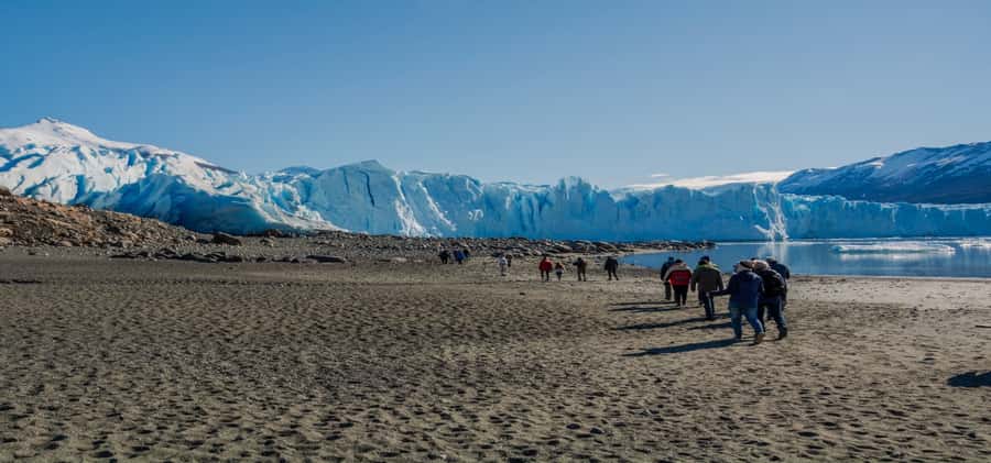 El Calafate: Safari Azul Los Glaciares Trekking Tour - Crossing Lago Rico toward the ice