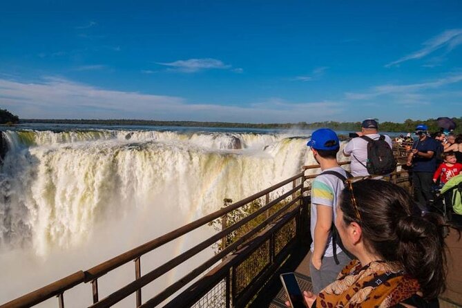 Full Day tour Argentinean Iguazú Falls with Jungle Adventure - Devil’s Throat begins with a train and a long walkway