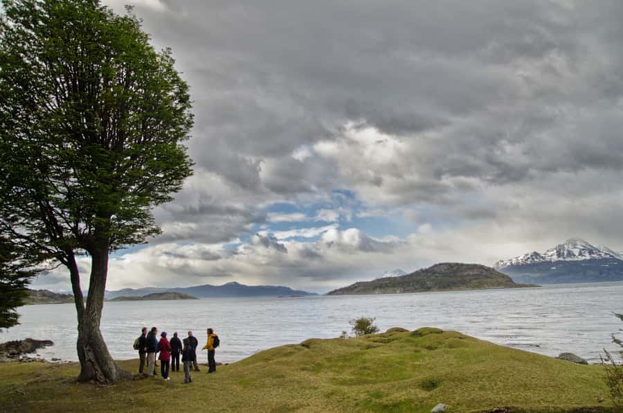 Ushuaia: Tierra del Fuego Trekking and Canoeing - Paddling from river water toward Lapataia Bay